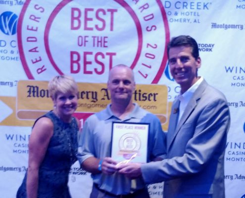 Aaron Luck receiving his award for Reader's choice award for best attorney 2017